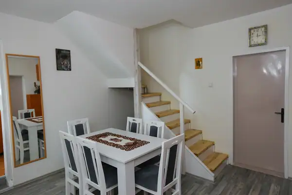 Dining area next to the stairs