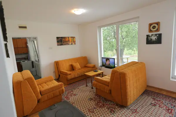 Spacious living room with cable TV