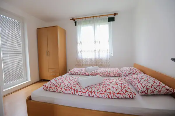 Bright bedroom with a double bed