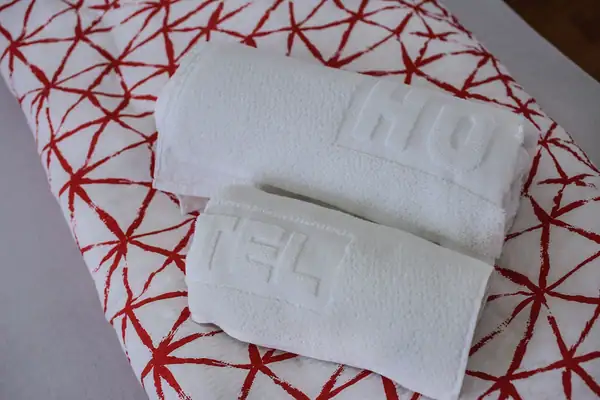 Close-up of bed linen and towels