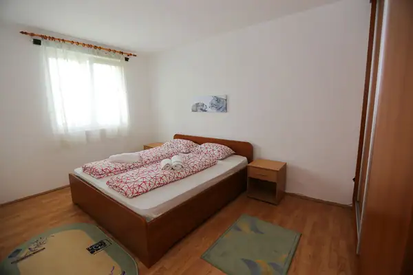 Double bed and a bedside table