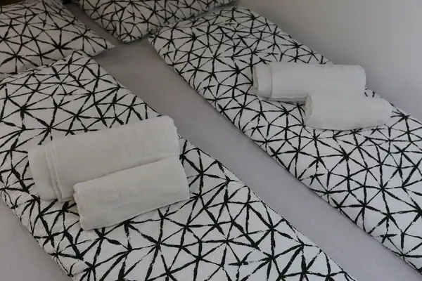 Close-up of black and white linen and towels