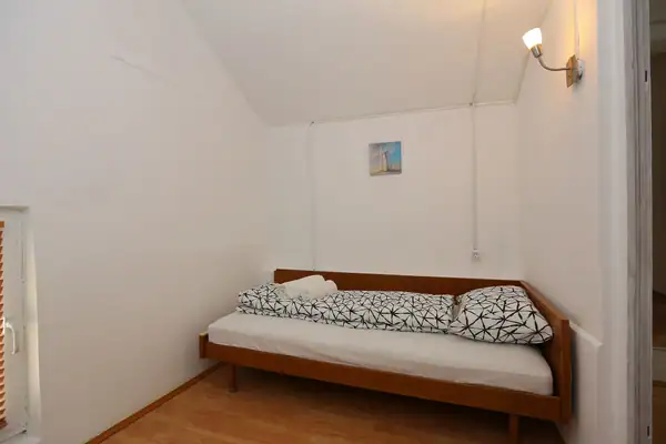 Bed in an attic room