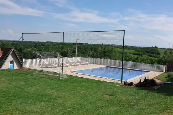 Mini football goal next to the pool