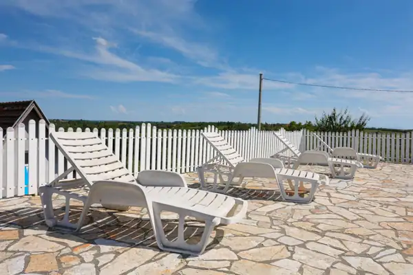 Sun loungers by the pool